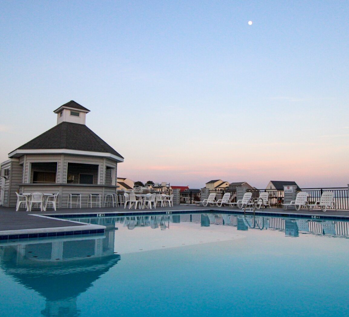 Marina Club outdoor pool and tiki bar overlooks Chincoteague Bay